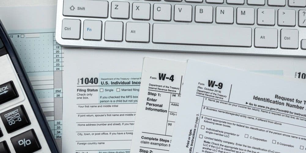 Tax documents on a table.